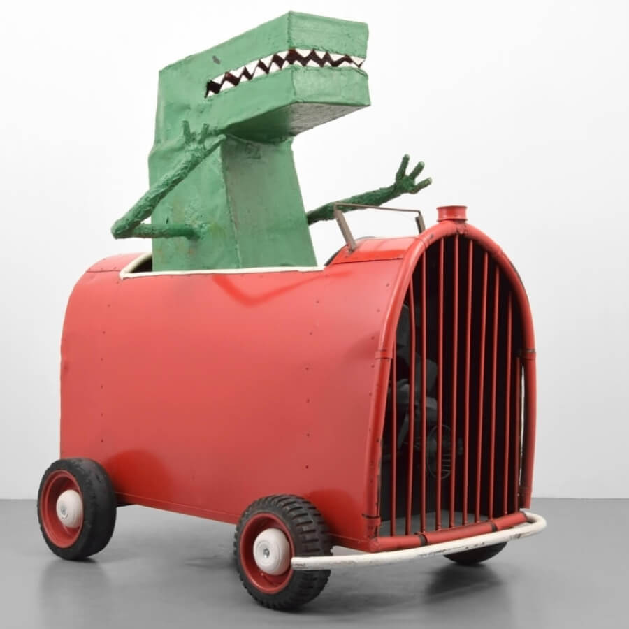 Dinosaur in a Car Sculpture