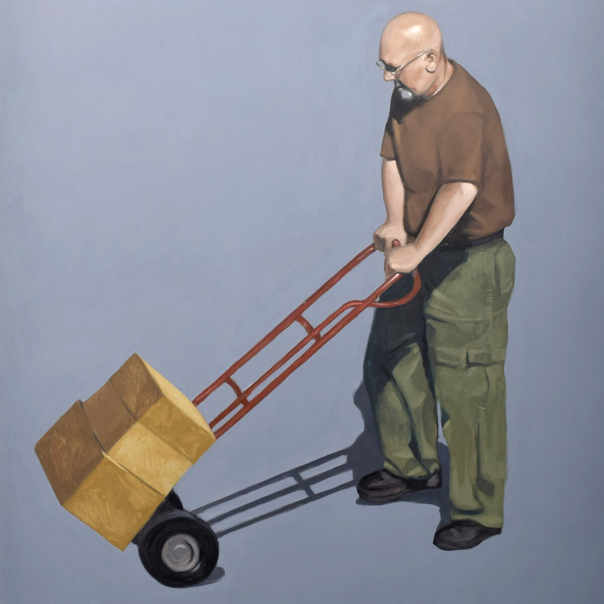Detail of realist painting of a man moving cardboard boxes on a hand cart